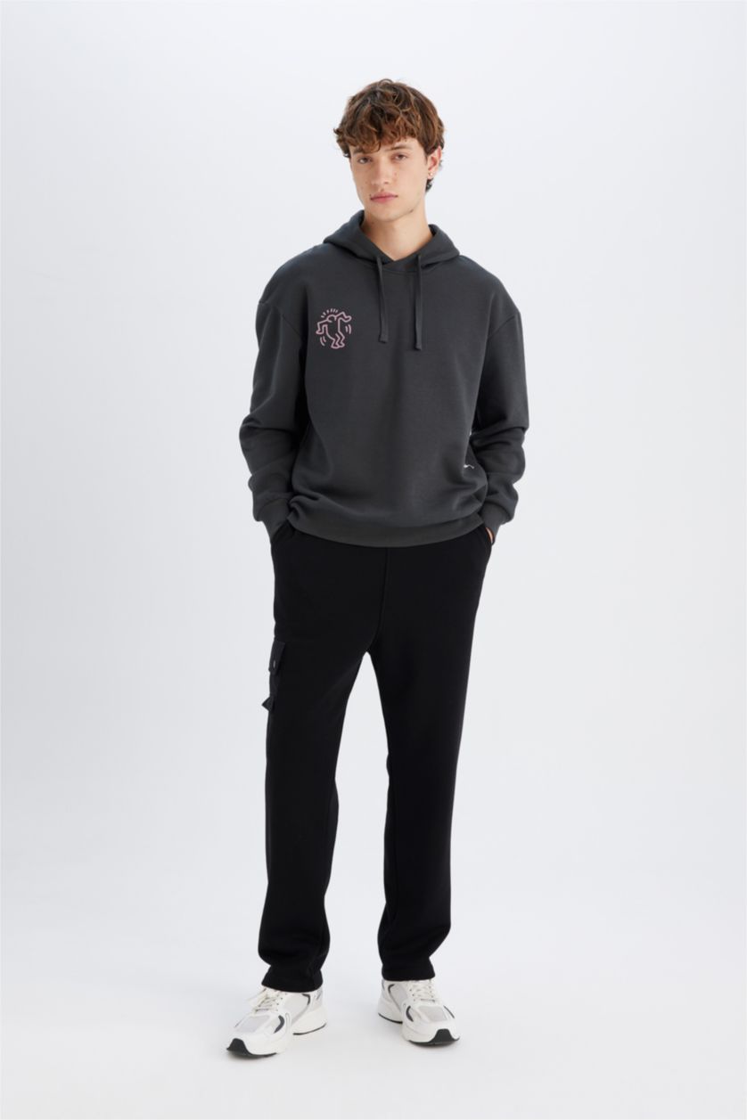 رجالي أنثرا سويت شيرت اوفر سايز بكابيشون من كيث هارينغ