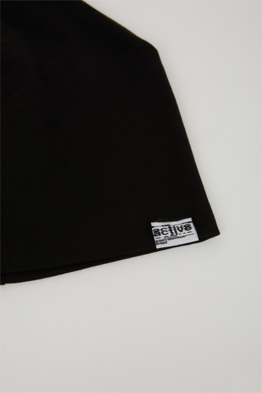 HOMME Noir Bonnet en peigné imprimé Label pour Homme