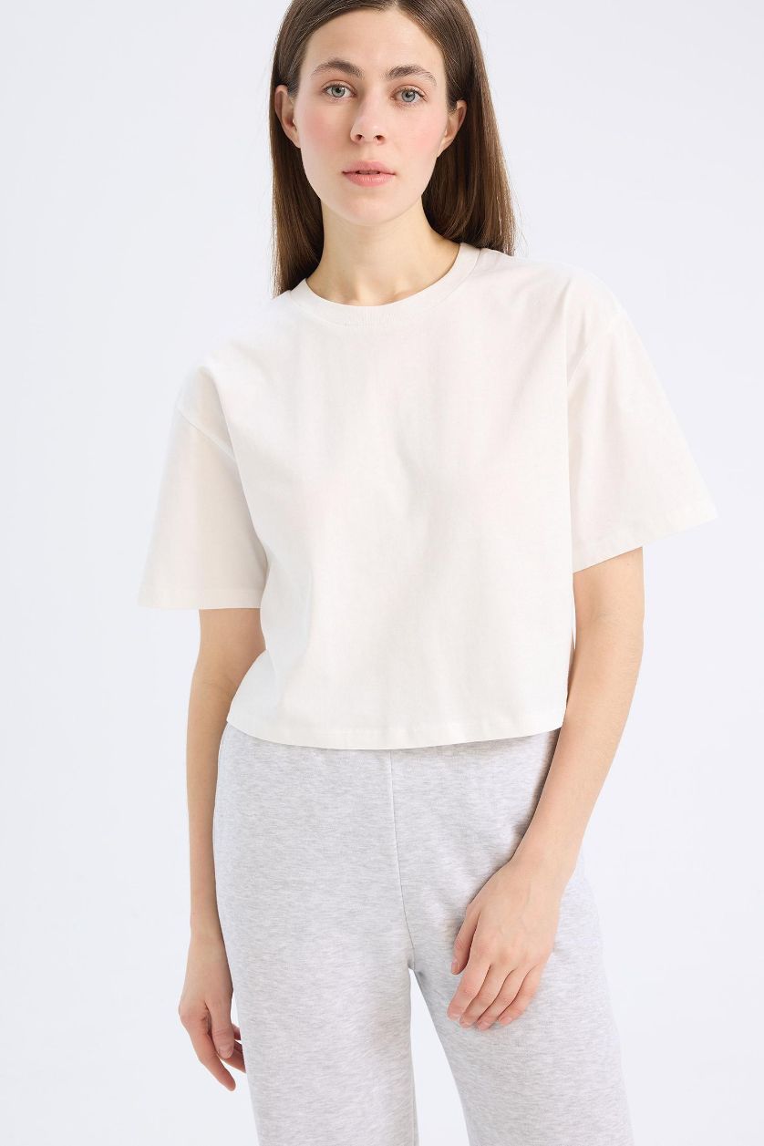 نساء بيج فاتح تيشيرت اوفر سايز من جيرسي برقبة مستديرة