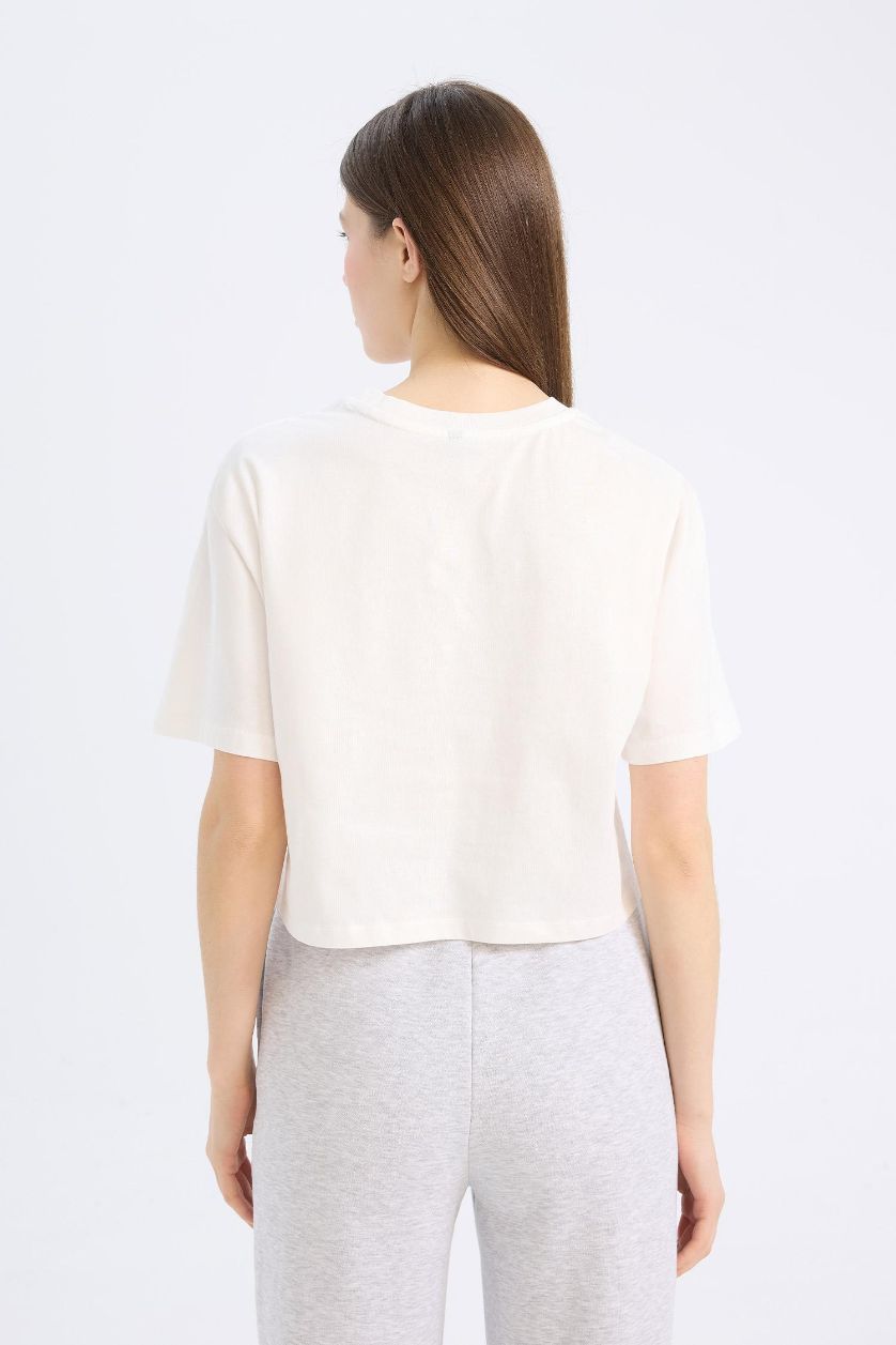 نساء بيج فاتح تيشيرت اوفر سايز من جيرسي برقبة مستديرة