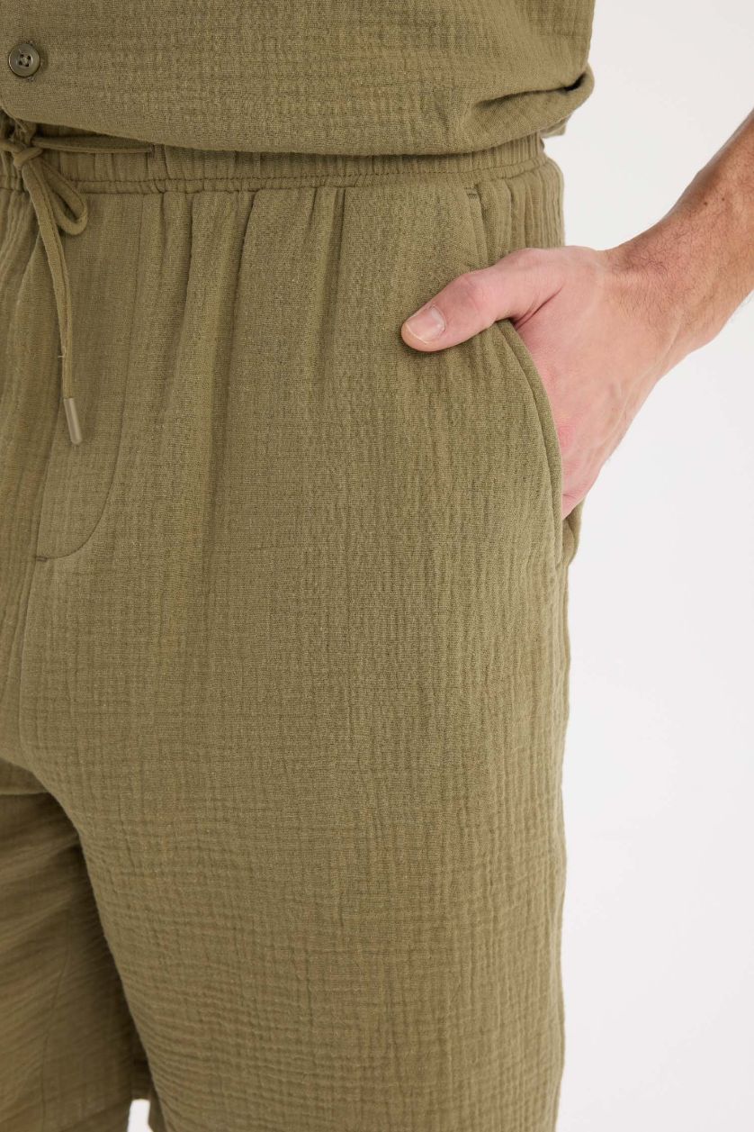 رجال كاكي فاتح شورت قطن قصة مريحة بجيوب