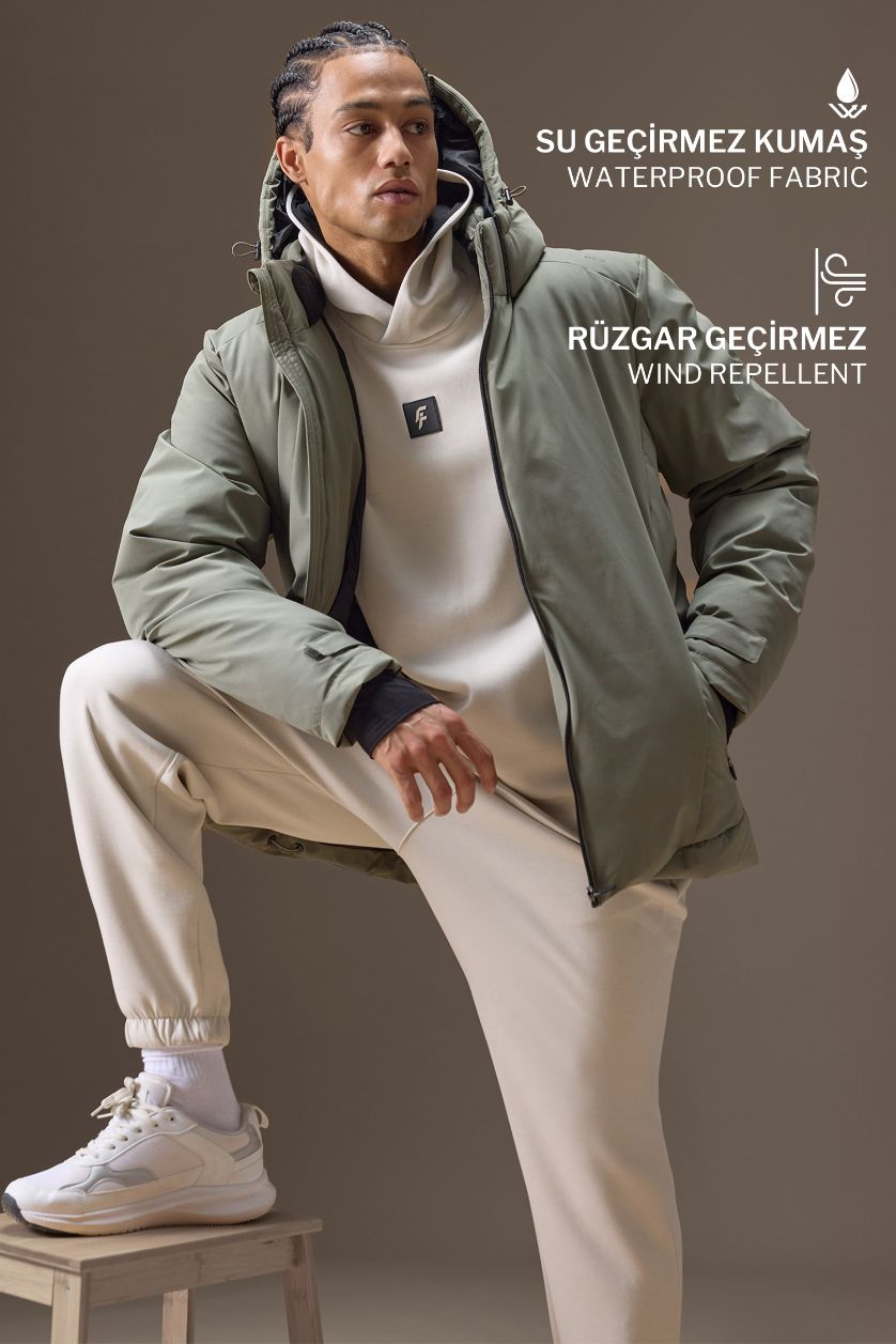 رجال كاكي فاتح جاكيت تزلج مقاوم للماء مطبوع قصة عادية بغطاء للرأس