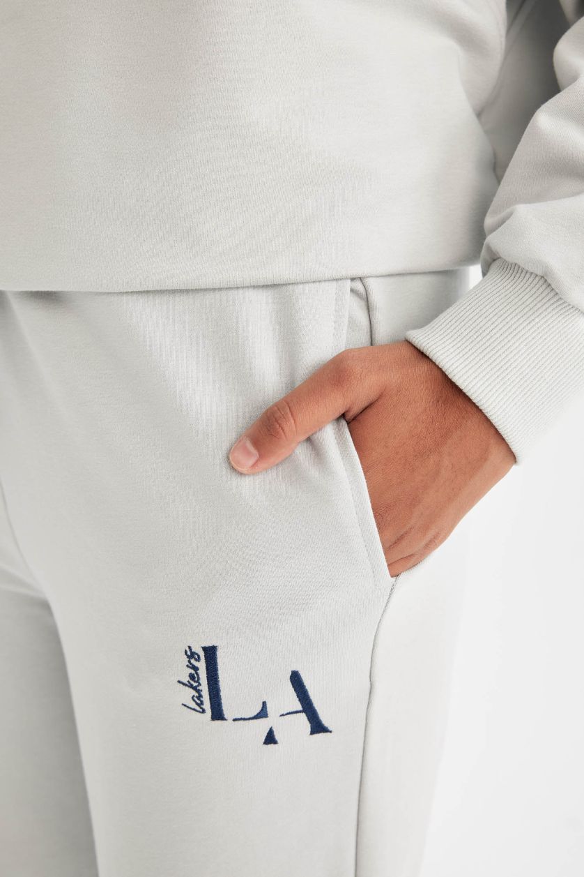 حريمي رمادي فاتح بنطلون سويت بانتس اوفر سايز برقبة مستديرة