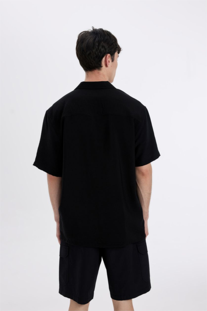 Man Black Relax Fit Polo Neck Short Sleeve Shirt