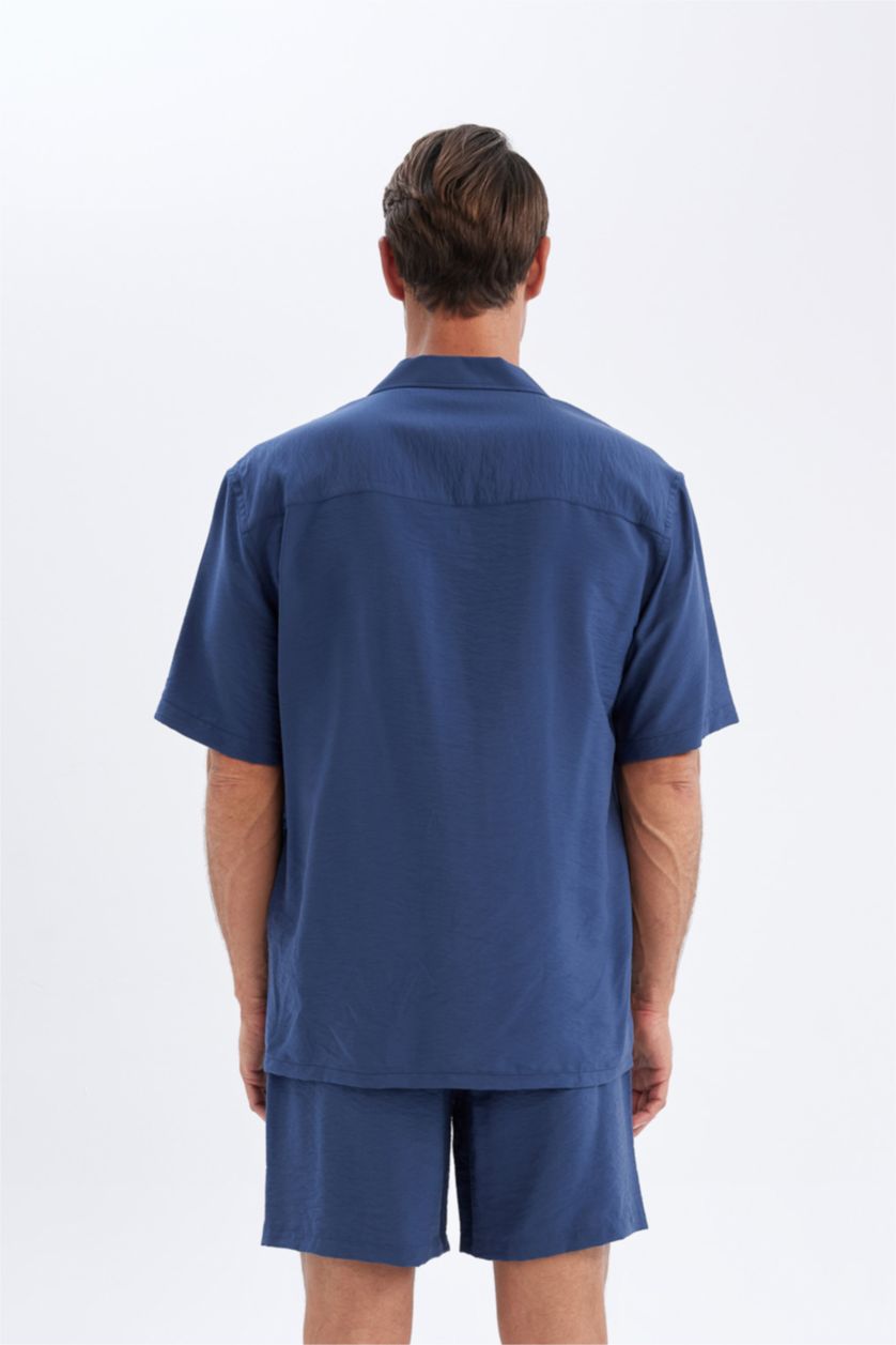 رجال كحلي قميص بولو نص ردن قصة مريحة