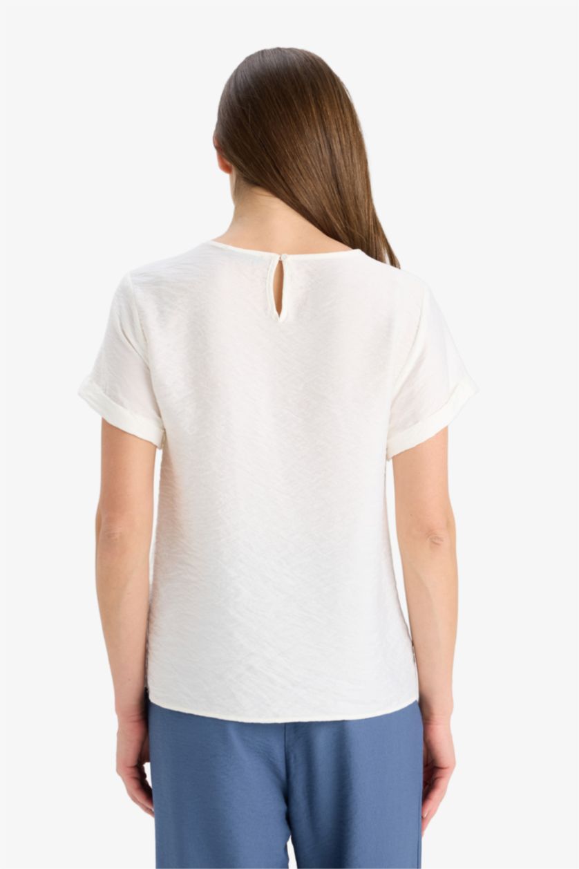 نساء بيج فاتح بلوزة نص ردن قصة عادية بياخة مدورة