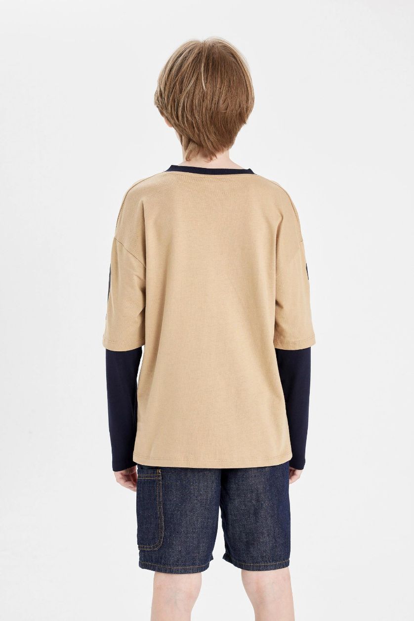 أولادي بيج تيشيرت اولادي اوفر سايز كم طويل بطبعة من الخلف بياقة V