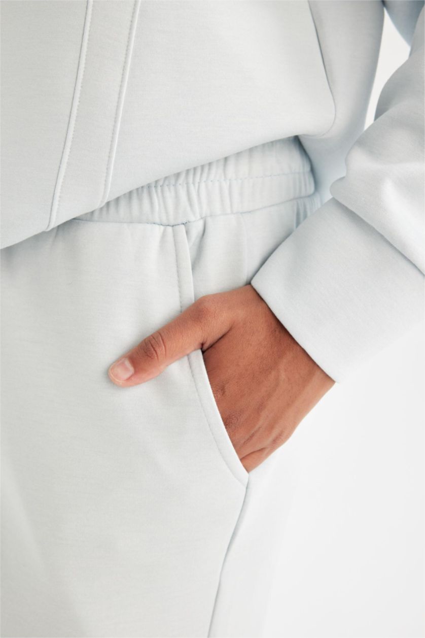 نساء أزرق فاتح بنطلون بجامة رياضي قماش سكوبا قصة عادية من DeFactoFit