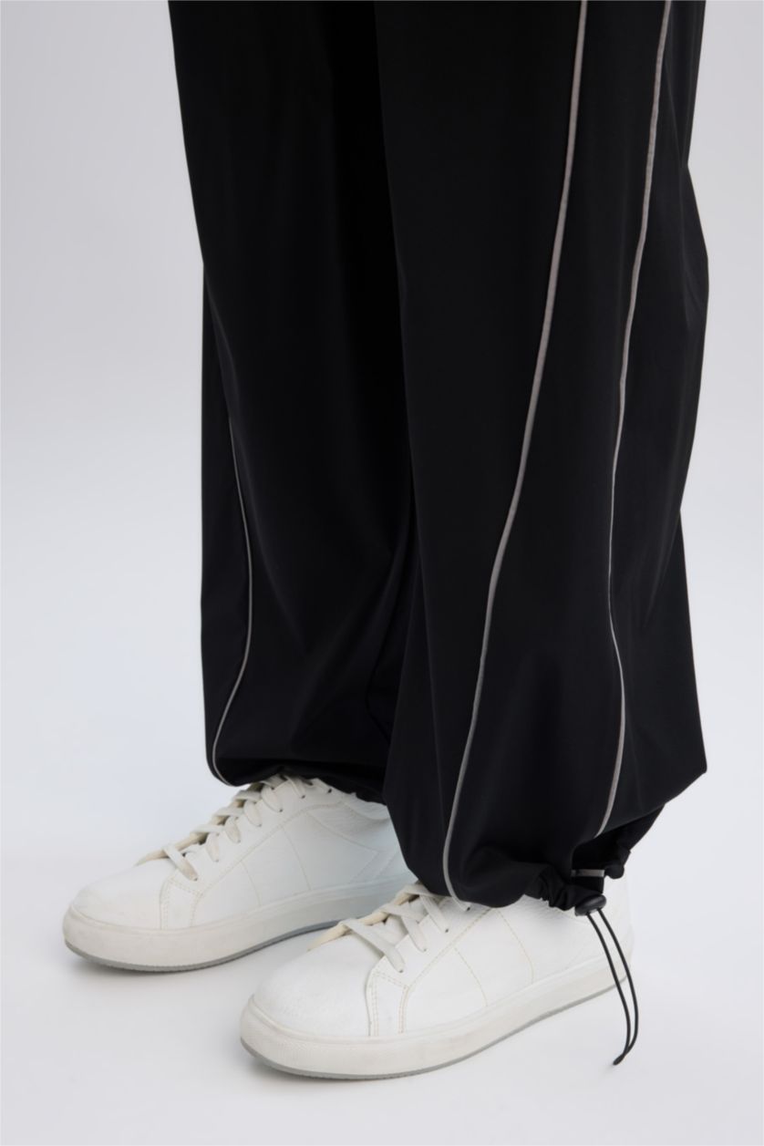 Kadın Siyah Wide Leg Geniş Paça Paçası Ayarlanabilir Cepli Sporcu Dokuma Pantolon