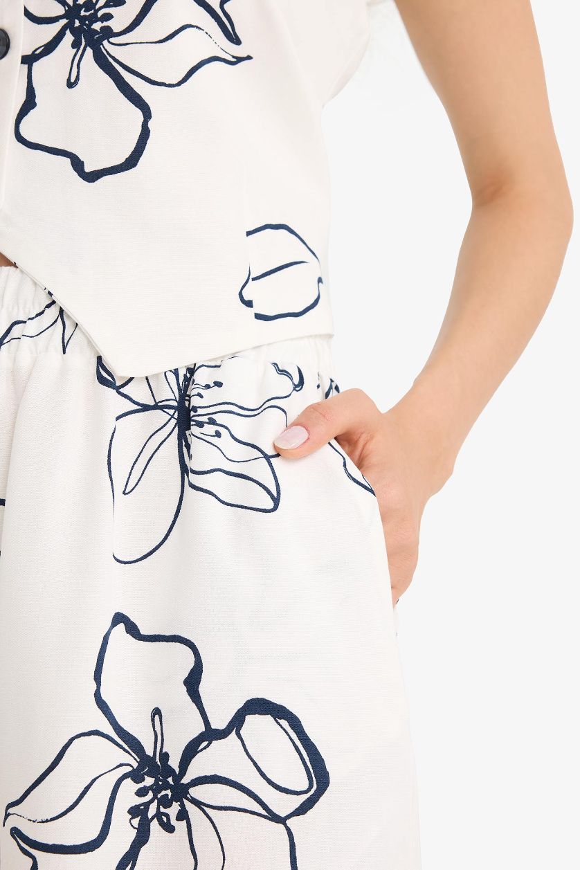 حريمي بيج فاتح شورت قصة عادية من مزيج الكتان وخصر عادي