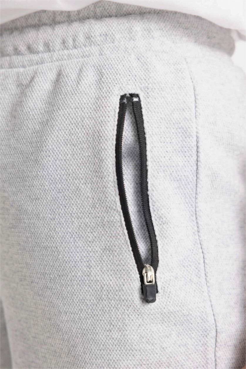 أولادي ميلانج رمادي فاتح شورت اولادي قصة عادية بجيب