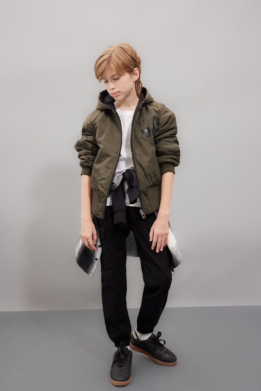 أولاد أسود قمصلة نفخ ذو وجهين بغطاء للرأس