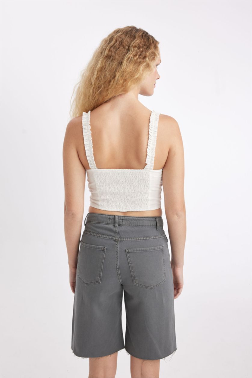 نساء اوف وايت بلوزة بدون كم برقبة V