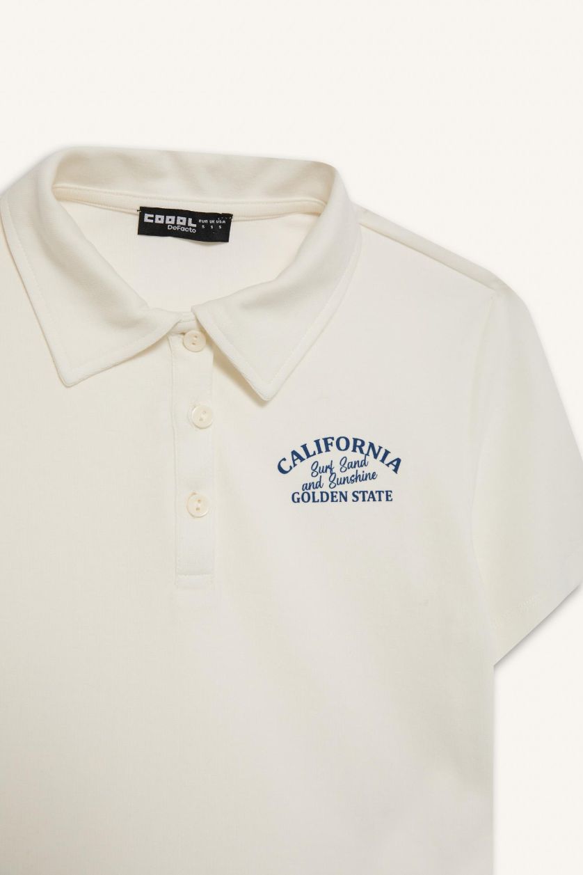 نساء اوف وايت تيشيرت بولو نص كم نسيج مشروط بطبعة شعار سليم فيت