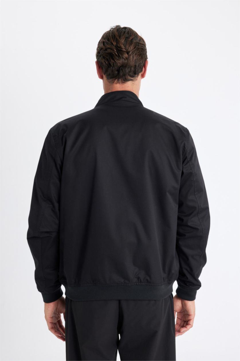 رجالي أسود جاكيت خفيف سليم فيت بياقة عالية وتر برووف بجيوب بسوسته