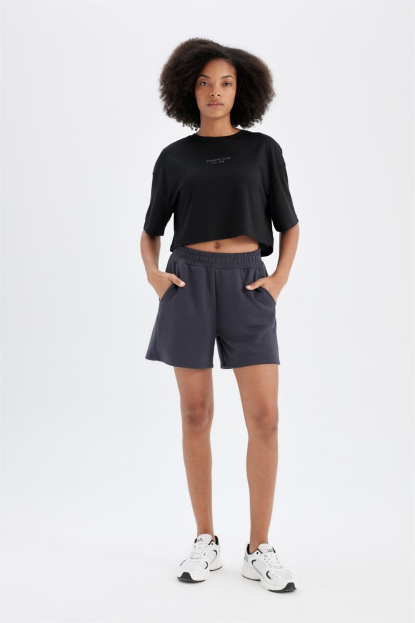 نساء أسود تيشيرت رياضي اوفر سايز نص ردن بطبعة شعار من DeFactoFit