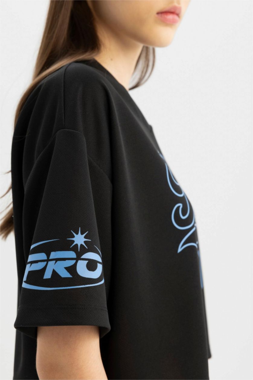 نساء أسود تيشيرت نص ردن اوفر سايز مطبوع بياخة V