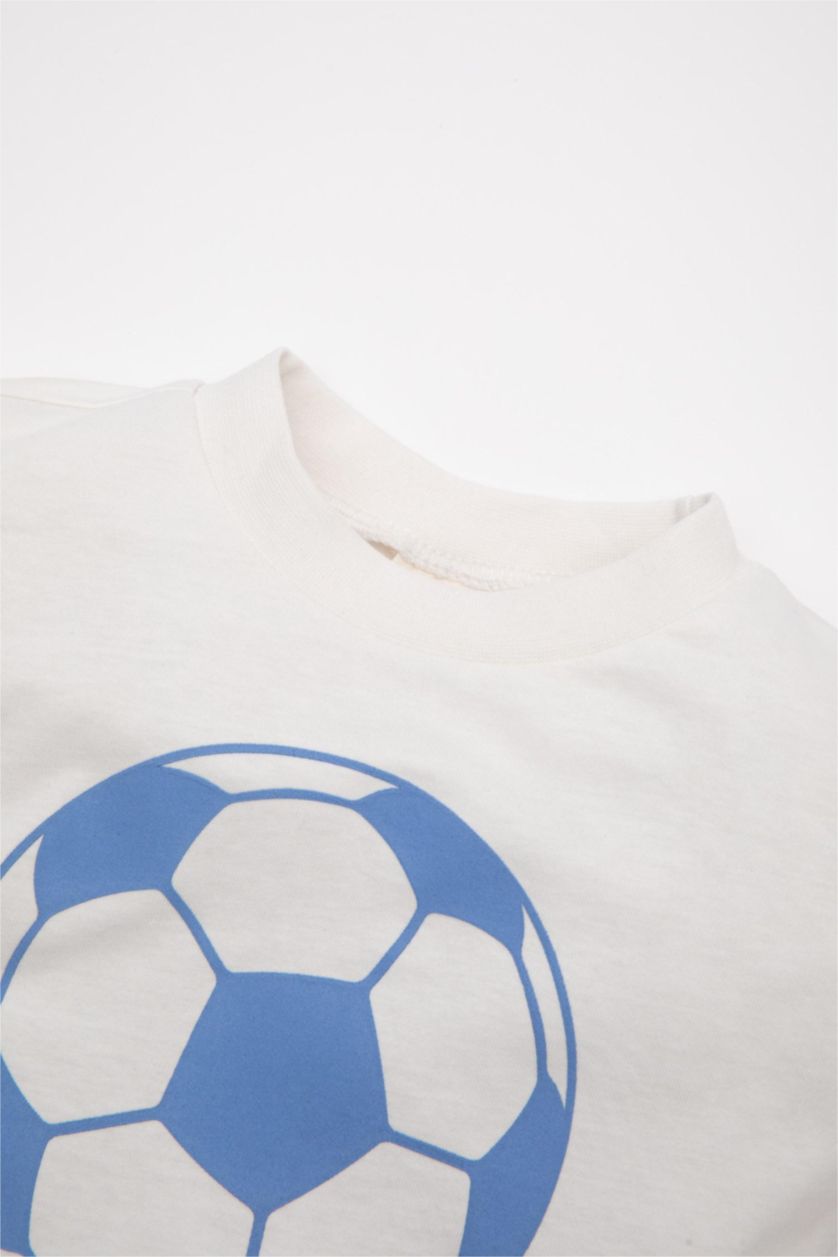 طفل صغير بيج فاتح طقم بيبي اولادي شورت وتيشيرت - قطعتين