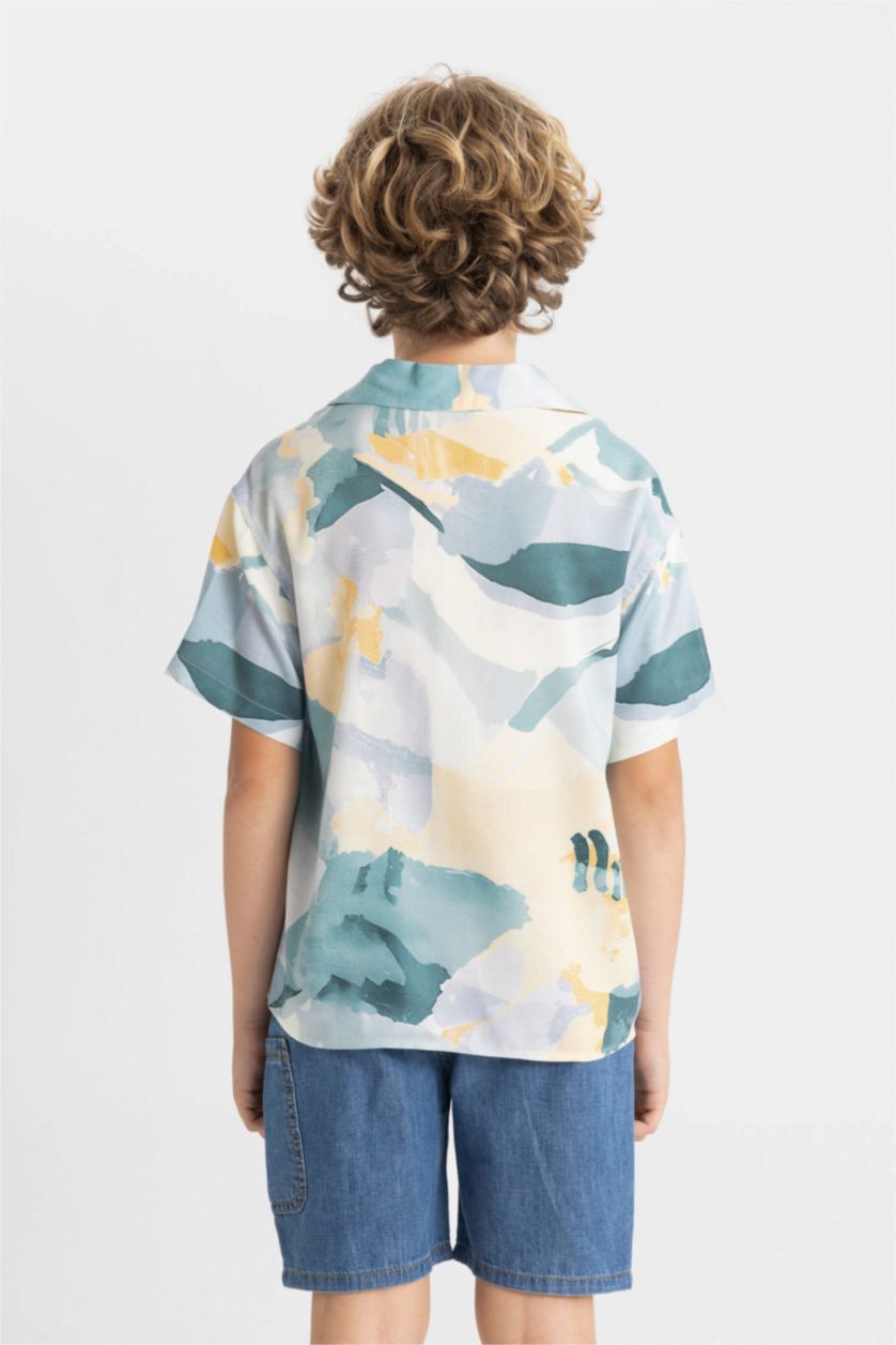 أولاد أخضر فاتح قميص بولو ولادي فيسكوز نص ردن اوفر سايز