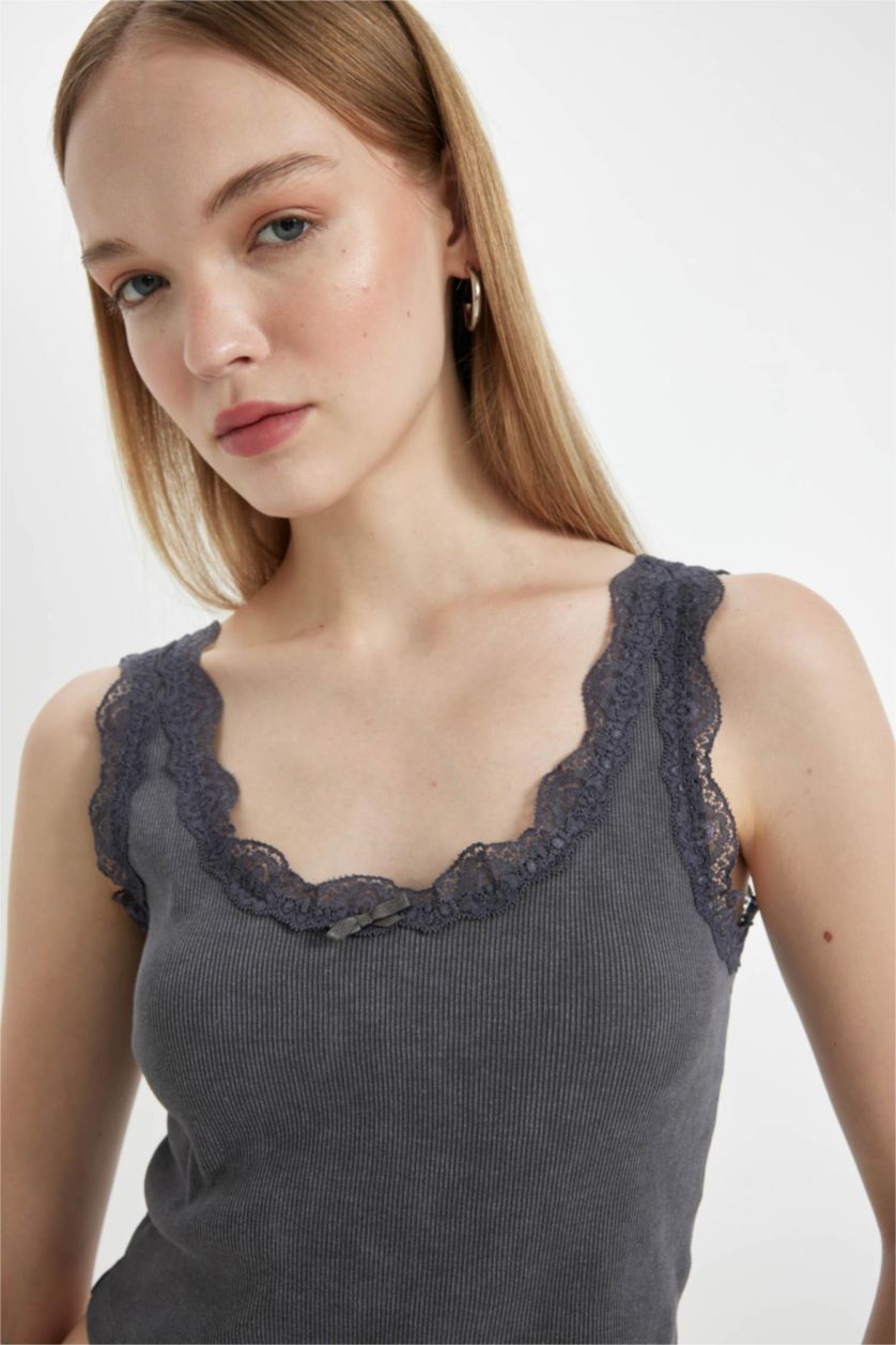 نساء أنثرا كروب توب سليم فيت مضلع