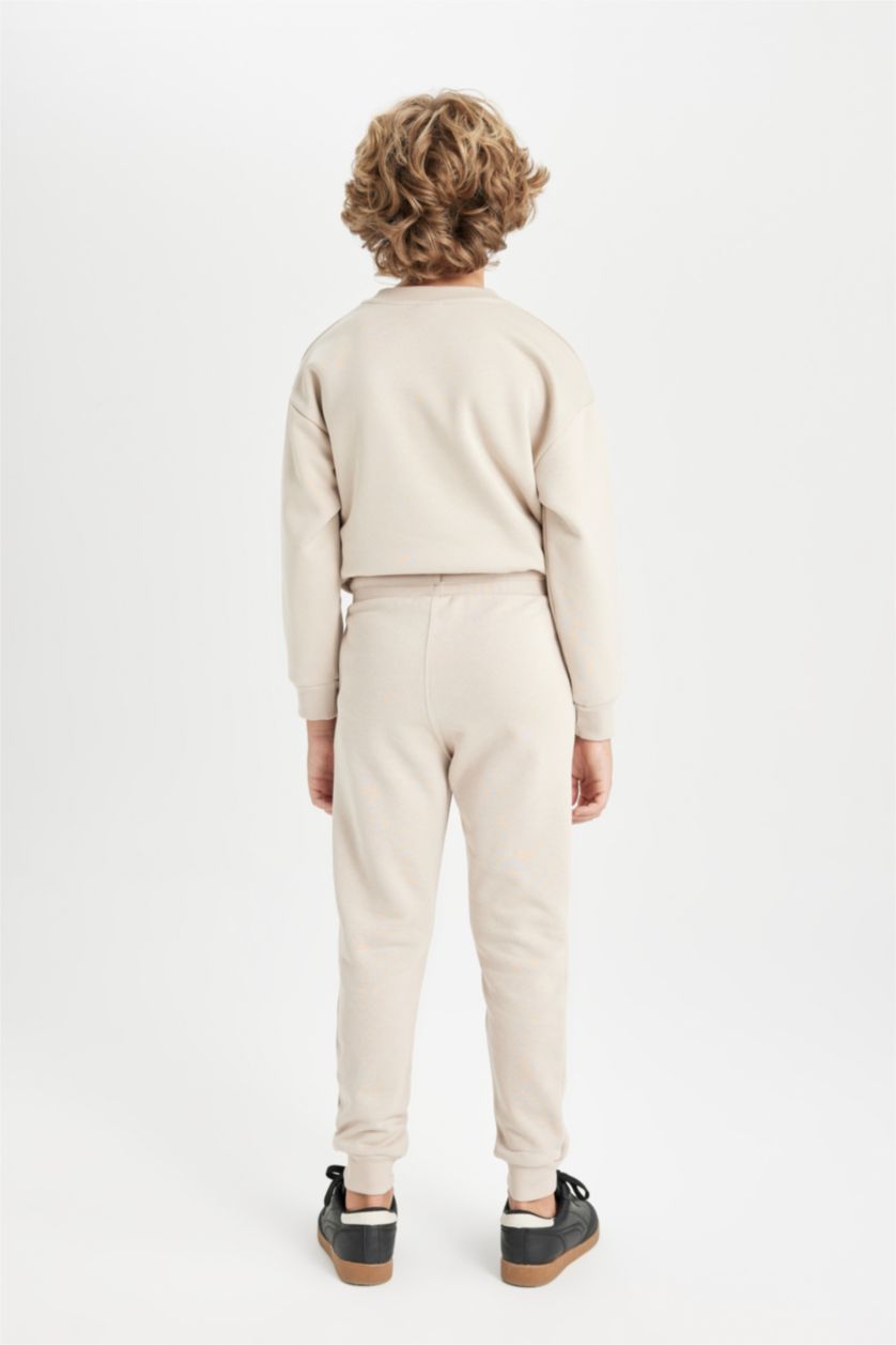 أولاد حجري فاتح سروال سويت بانتس ولادي جوجر قصة عادية ورجل مطاطي