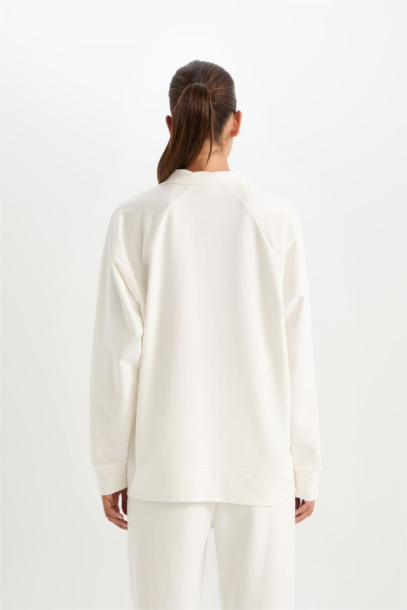 نساء بيج فاتح سويت شيرت رياضي واسع برقبة بولو