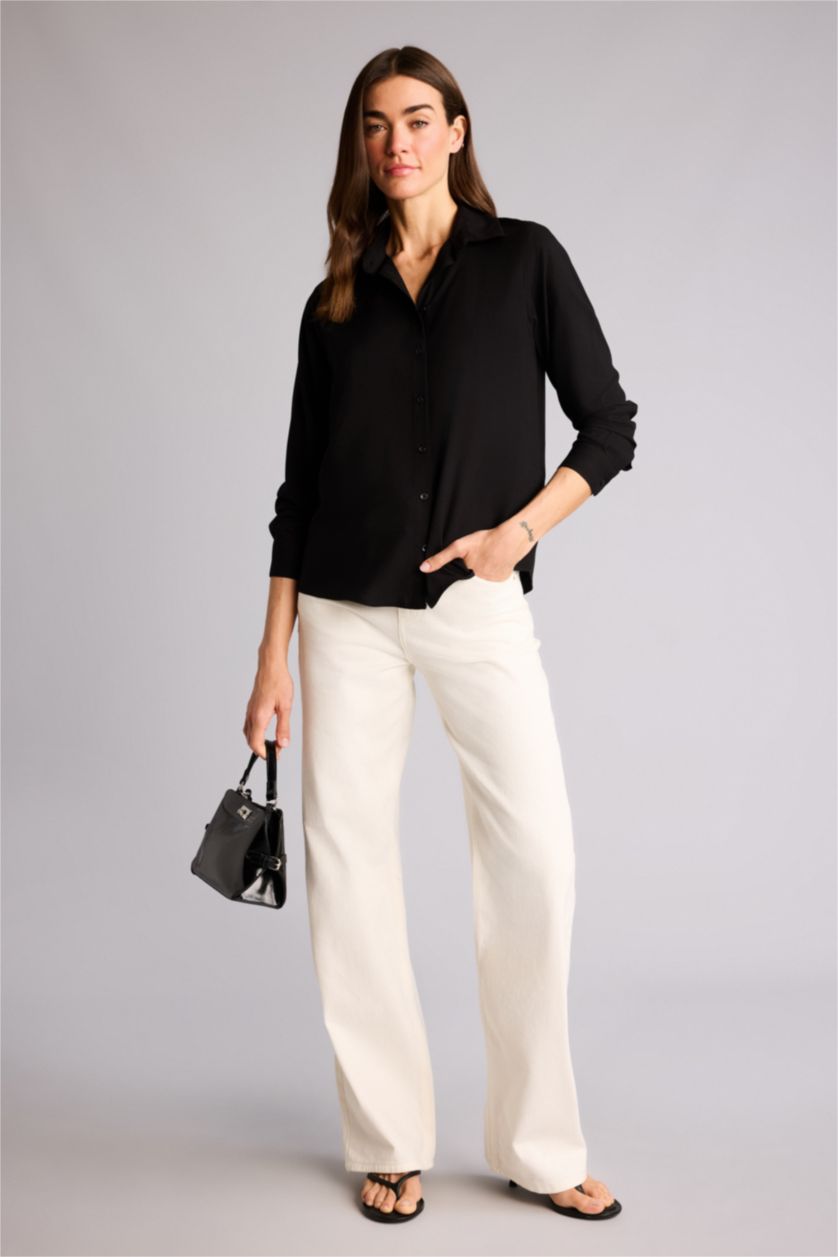 حريمي أسود قميص كم طويل اوفر سايز