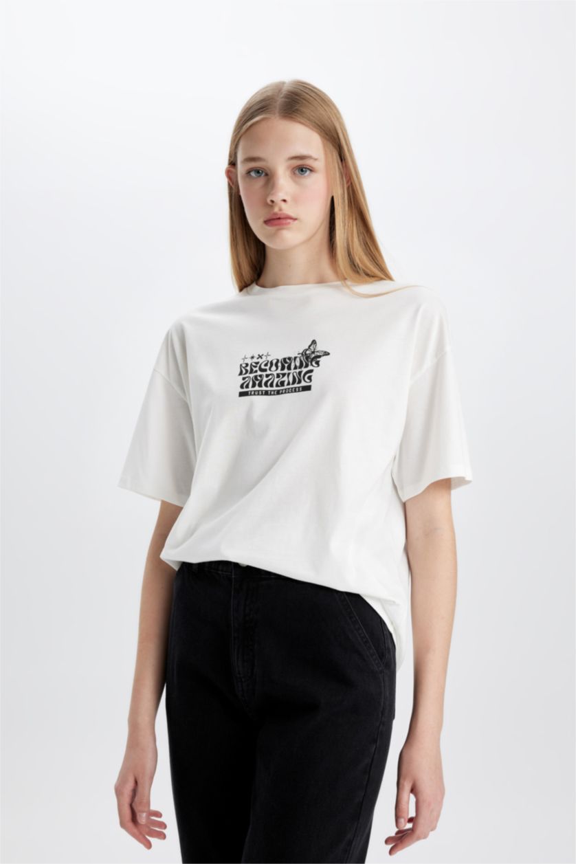 نساء بيج فاتح تيشيرت نص ردن اوفر سايز بياخة مستديرة