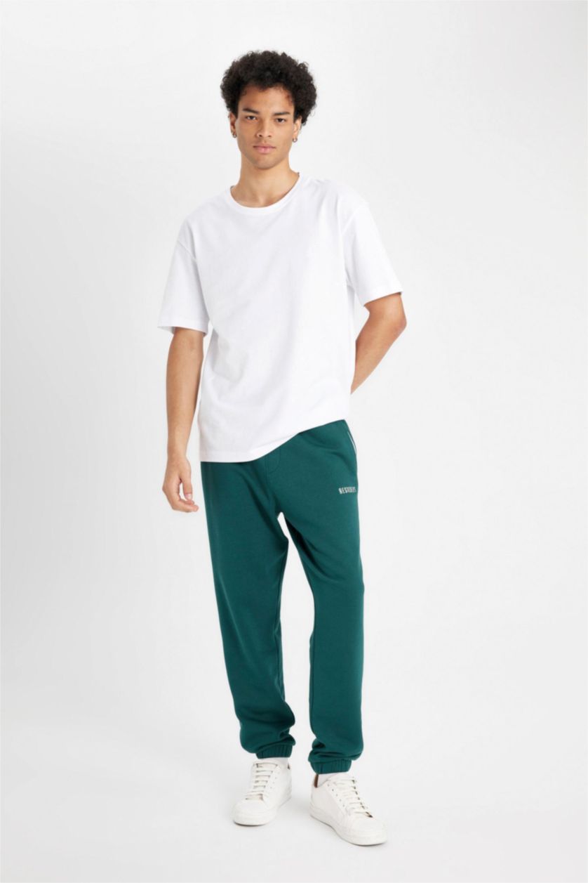 Erkek Koyu Yeşil Regular Fit Jogger Eşofman Altı Fleto Cepli Baskılı Beli Bağcıklı Lastikli Paça