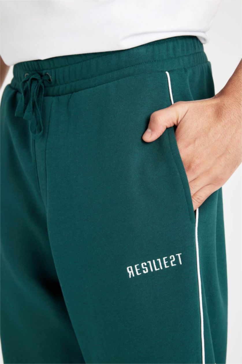 Erkek Koyu Yeşil Regular Fit Jogger Eşofman Altı Fleto Cepli Baskılı Beli Bağcıklı Lastikli Paça
