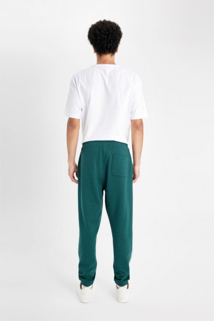 Erkek Koyu Yeşil Regular Fit Jogger Eşofman Altı Fleto Cepli Baskılı Beli Bağcıklı Lastikli Paça