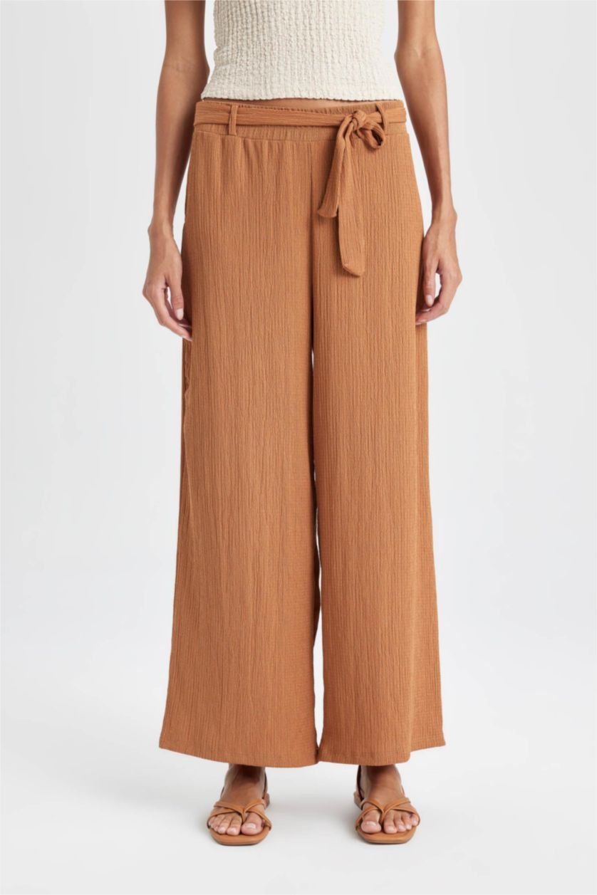 حريمي بني فاتح بنطلون كابري كولوت فيت برجل واسع