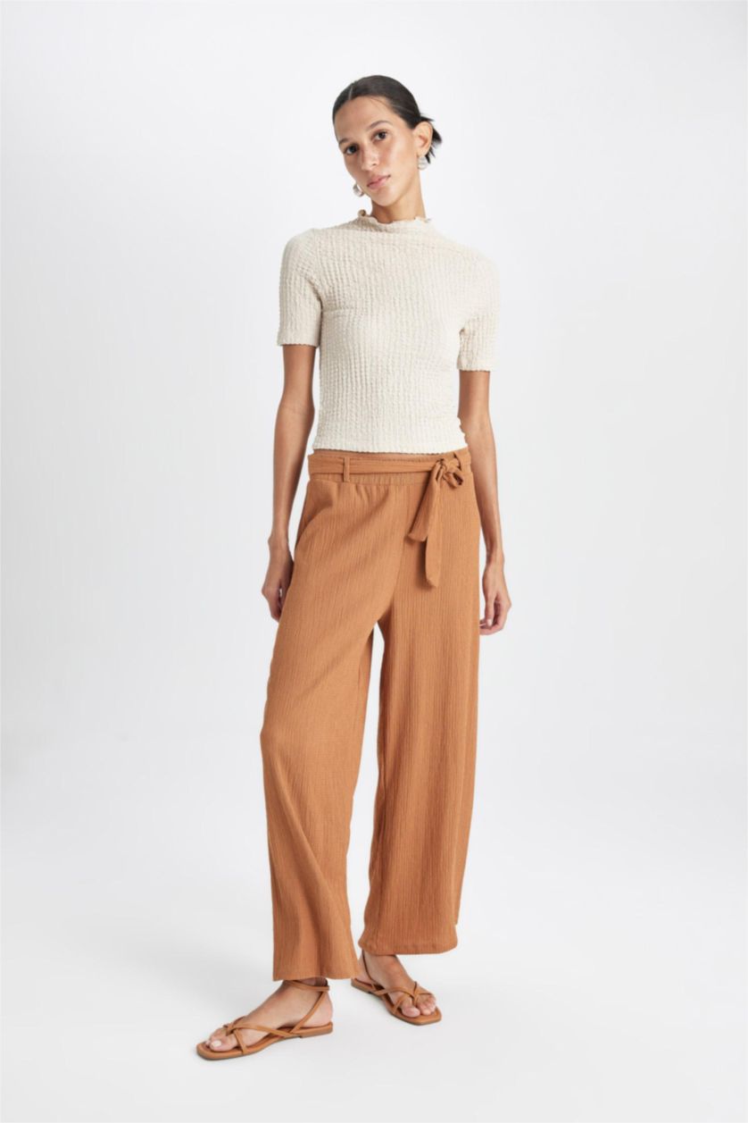 حريمي بني فاتح بنطلون كابري كولوت فيت برجل واسع