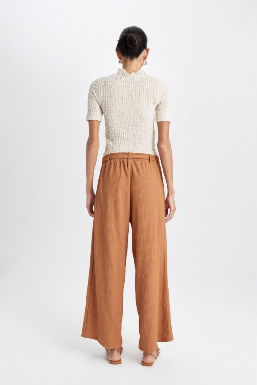 حريمي بني فاتح بنطلون كابري كولوت فيت برجل واسع