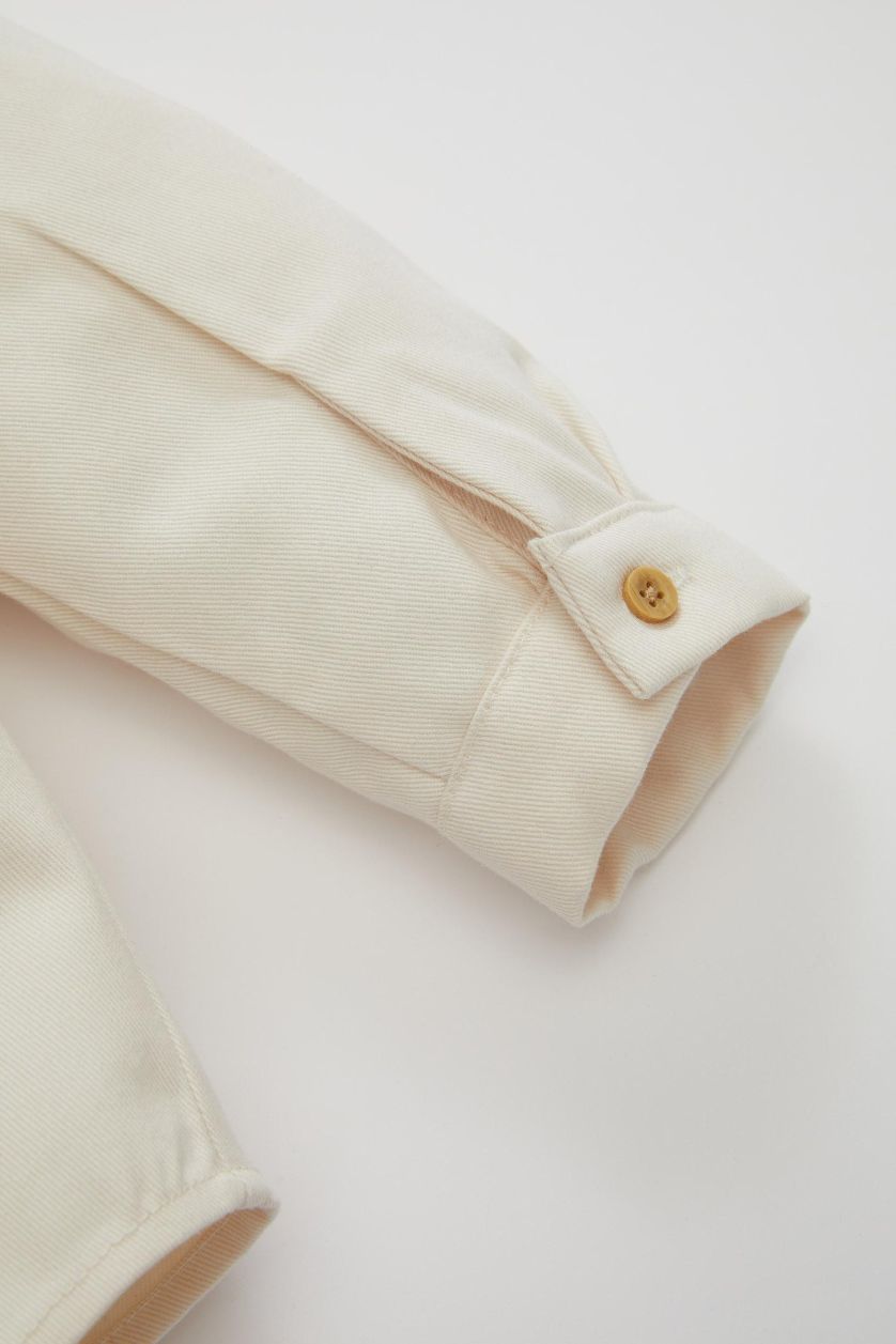 طفل صغير حجري فاتح قميص كم طويل بيبي اولادي جبردين قصة عادية بكابيشون