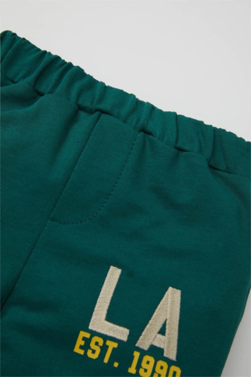 مولود ذكر أخضر غامق سروال سويت بانتس ولادي قصة عادية ورجل مطاطي