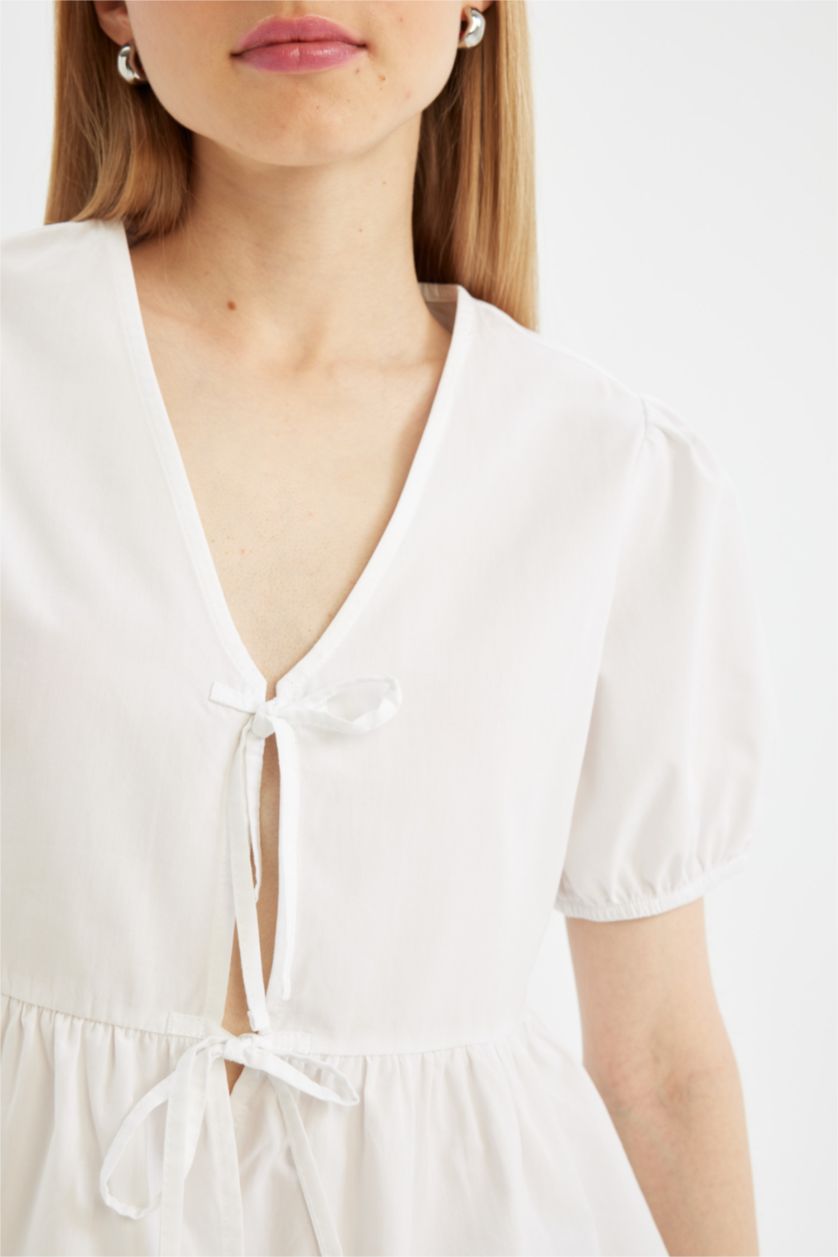 نساء أبيض بلوزة نص كم قصة عادية