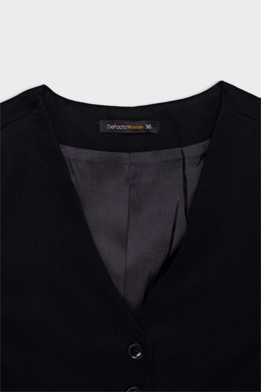 حريمي أسود فيست بياقة V