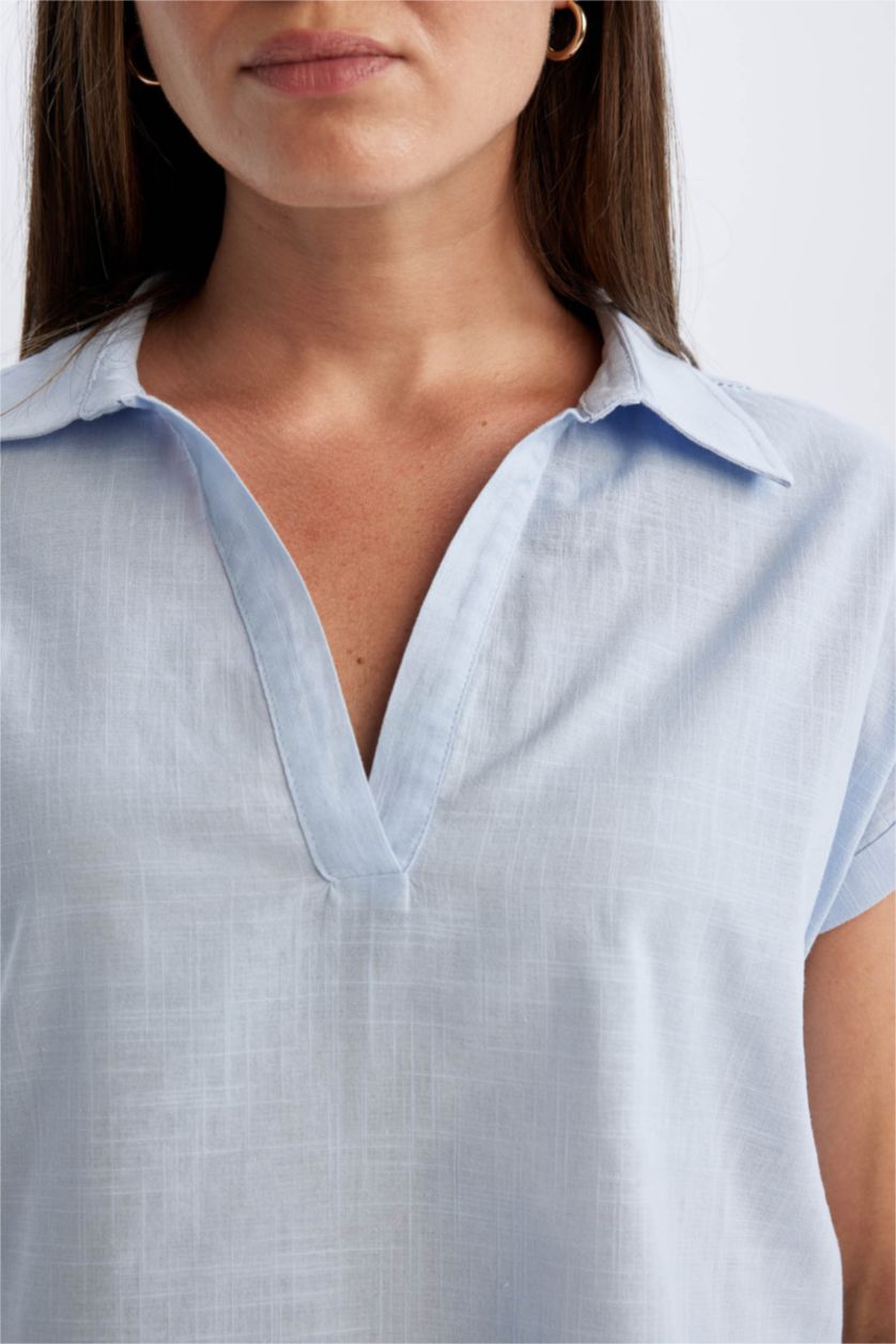 حريمي أزرق فاتح قميص قطن نص كم قصة عادية