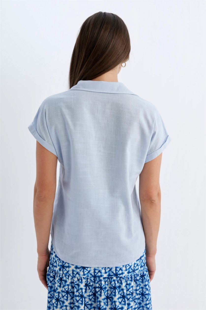 حريمي أزرق فاتح قميص قطن نص كم قصة عادية