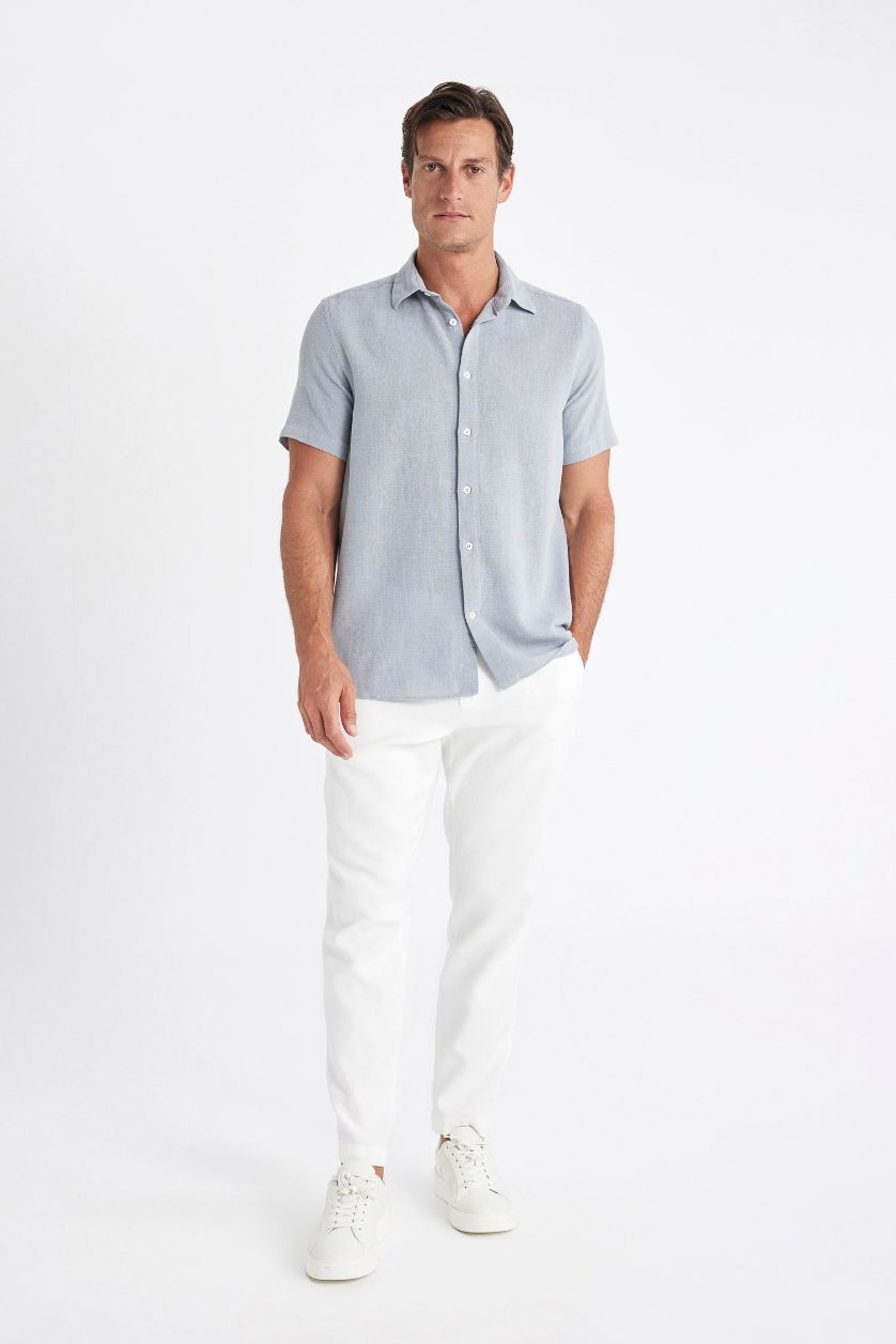 رجال رمادي قميص بولو قطن قصة عادية