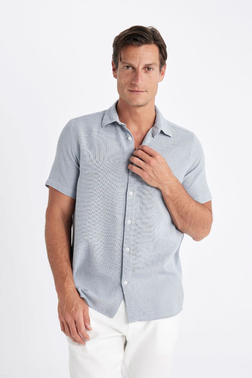 رجال رمادي قميص بولو قطن قصة عادية