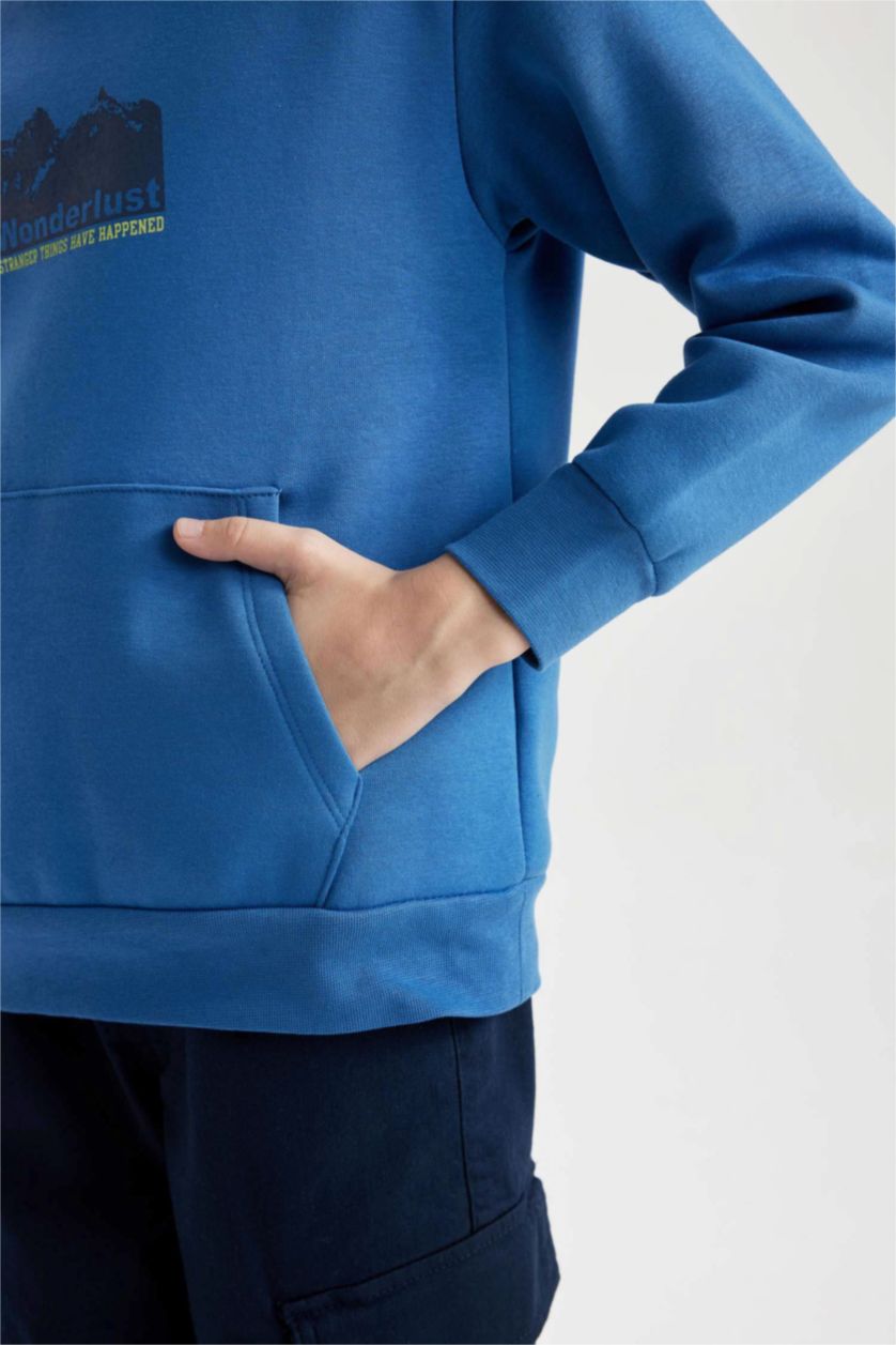 أولادي أزرق هودي اولادي تقيل قصة عادية بجيب وطبعة من الخلف