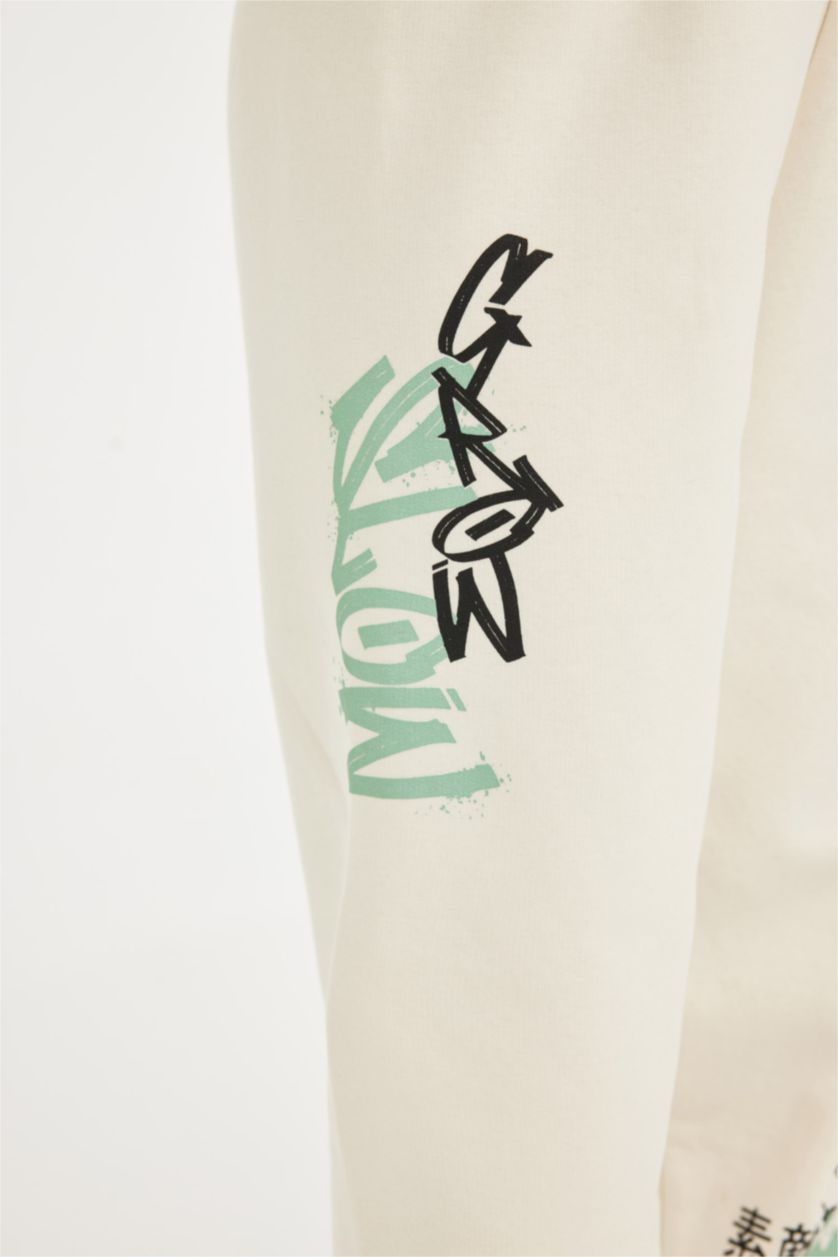 بنات بيج فاتح سروال رياضي للبنات مطبوع بخصر مطاطي