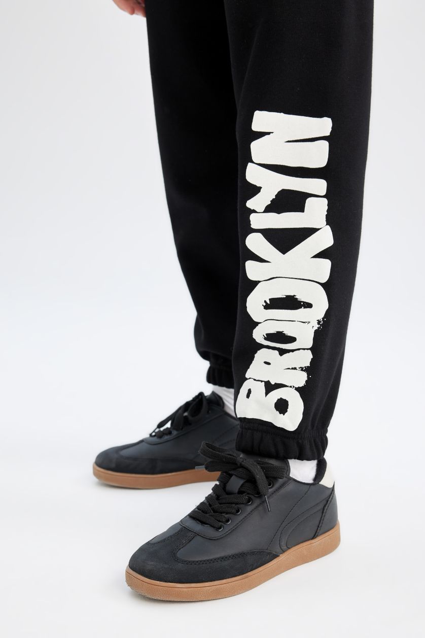 Kız Çocuk - Genç Kız Siyah Baskılı Beli Paçası Lastikli Siyah Jogger Eşofman Altı Kız Çocuk