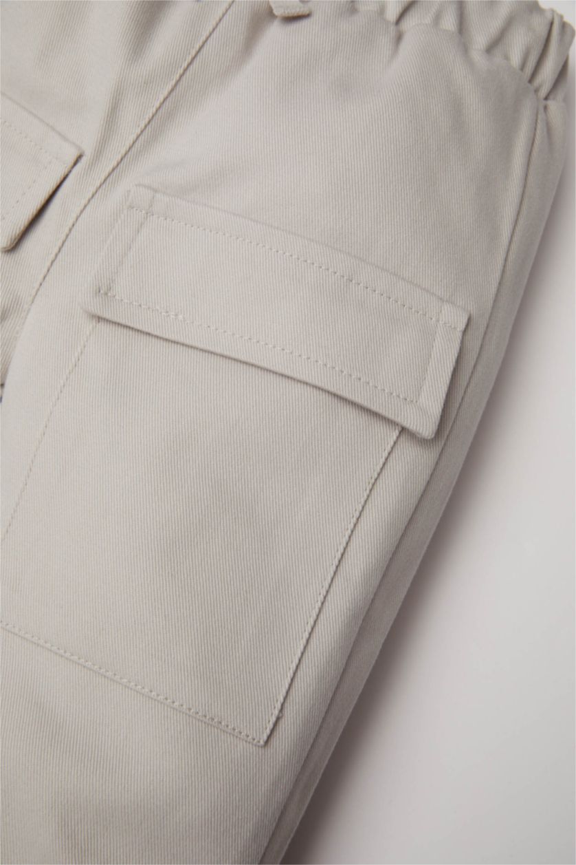 طفل صغير رمادي فاتح بنطلون بيبي اولادي كارجو جبردين قصة عادية بجيب