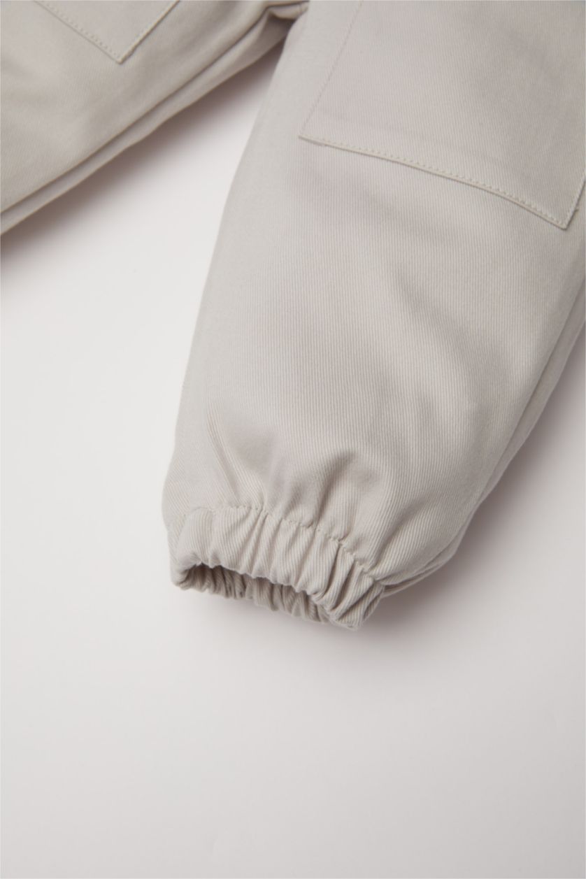 طفل صغير رمادي فاتح بنطلون بيبي اولادي كارجو جبردين قصة عادية بجيب