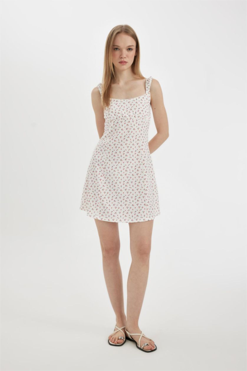 نساء أبيض فستان قصير منسوج بياخة V بحمالات