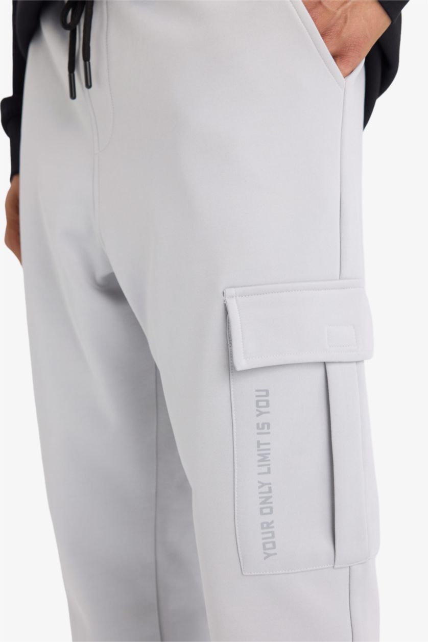 Erkek Açık Gri Sporcu Jogger Eşofman Altı Standart Fit Üç Cepli Beli Bağcıklı Lastikli Paça