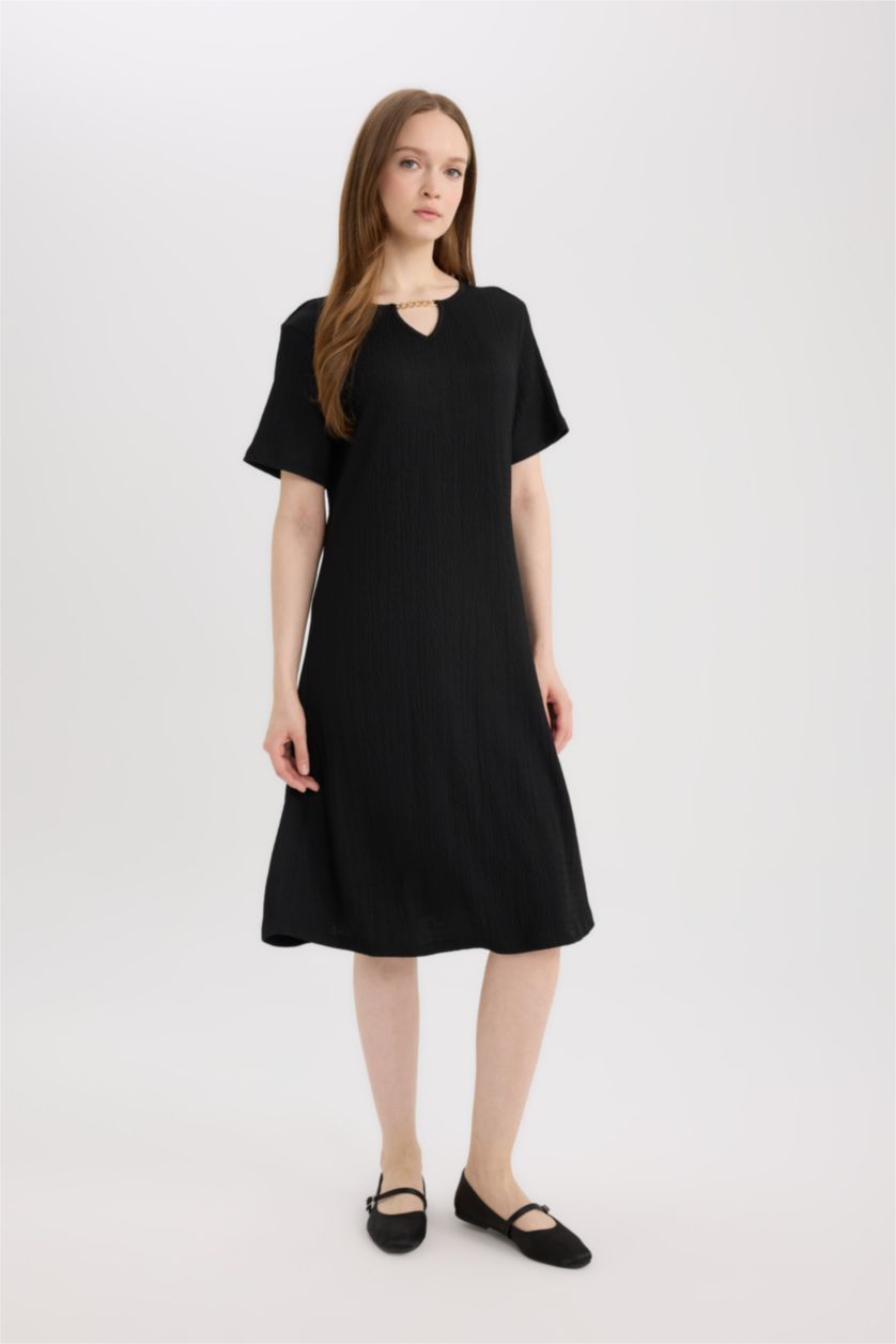 نساء أسود فستان قصير منسوج قصة عادية بياخة مستديرة